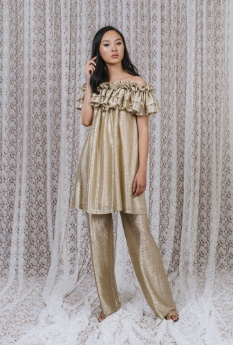 Siroun Dress Gold 2999 SEK, Piper Trousers 1799 SEK